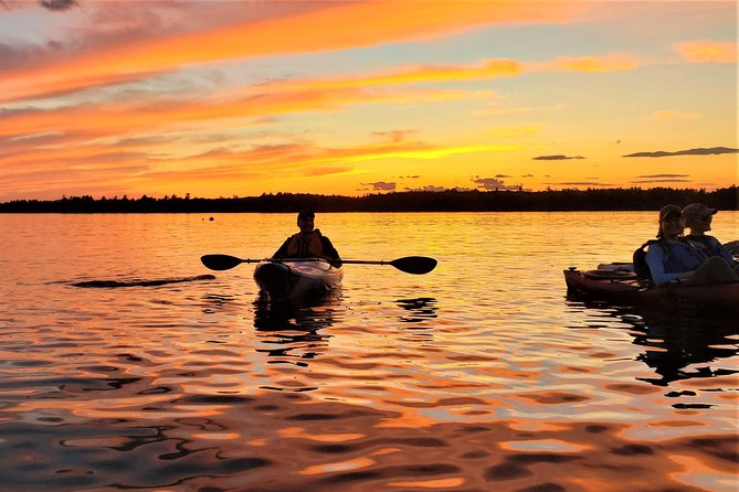 Sunset Tour by Kayak on Sebago Lake Maine - The Paddle Back Under the Bridge: A Small Challenge Worth Knowing